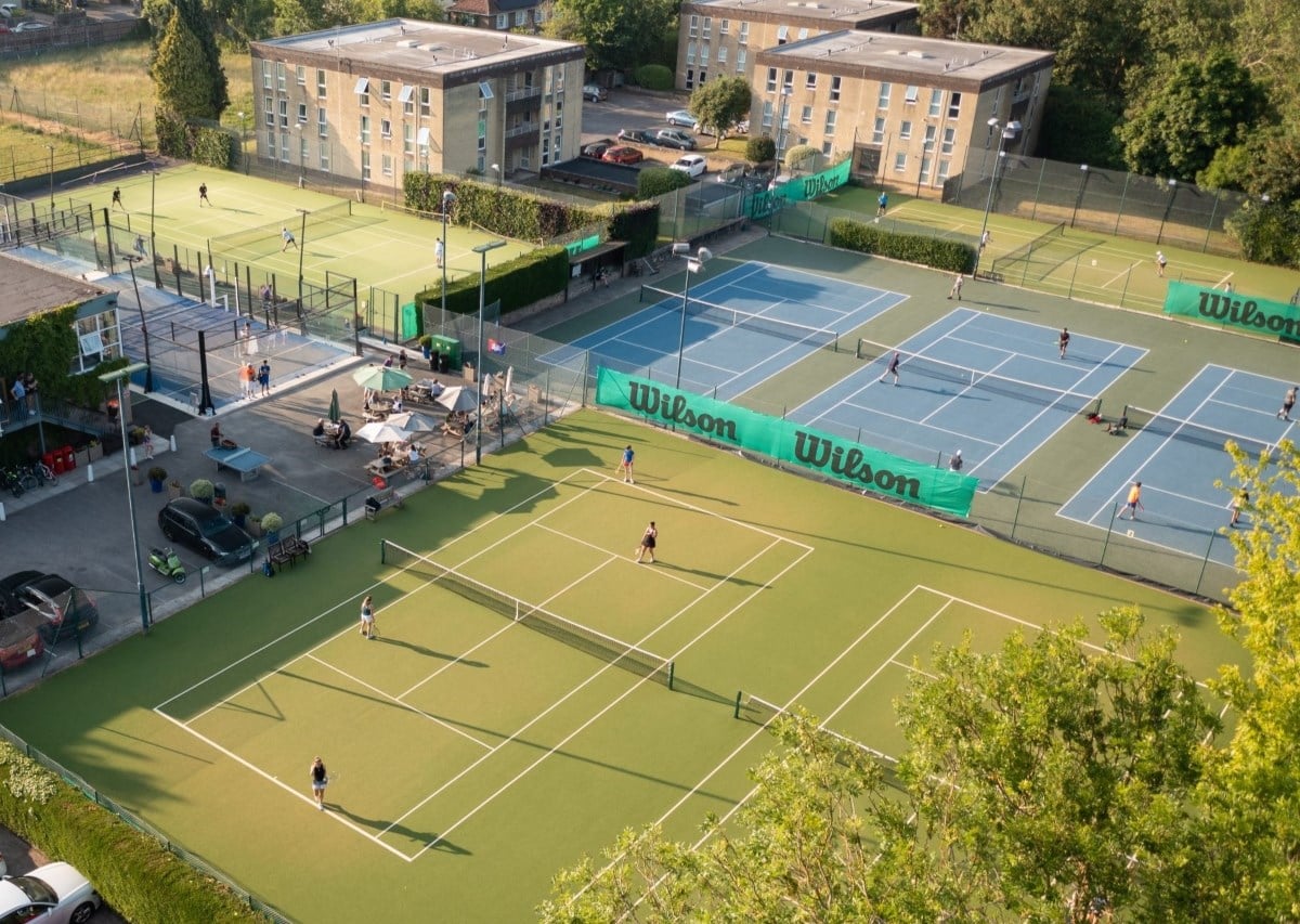 Courts at Redland Green's site in Bristol are lit by LED floodlights, one of a number of sustainability measures the club has put in place. (Image credit: Redland Green Club)